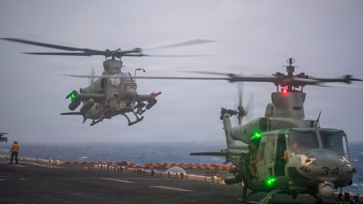 U.S. Marine Corps UH-1Y Venom and AH-1Z Viper, assigned to Marine Medium Tiltrotor (VMM) 163 (Reinforced), 11th Marine Expeditionary Unit (MEU), conduct flight operations of the flight deck of Wasp-class amphibious assault ship USS Boxer (LHD 4), July 1, 2026.