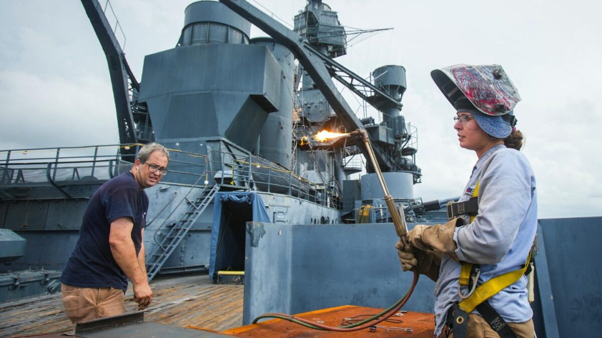 Welder on a navy boat