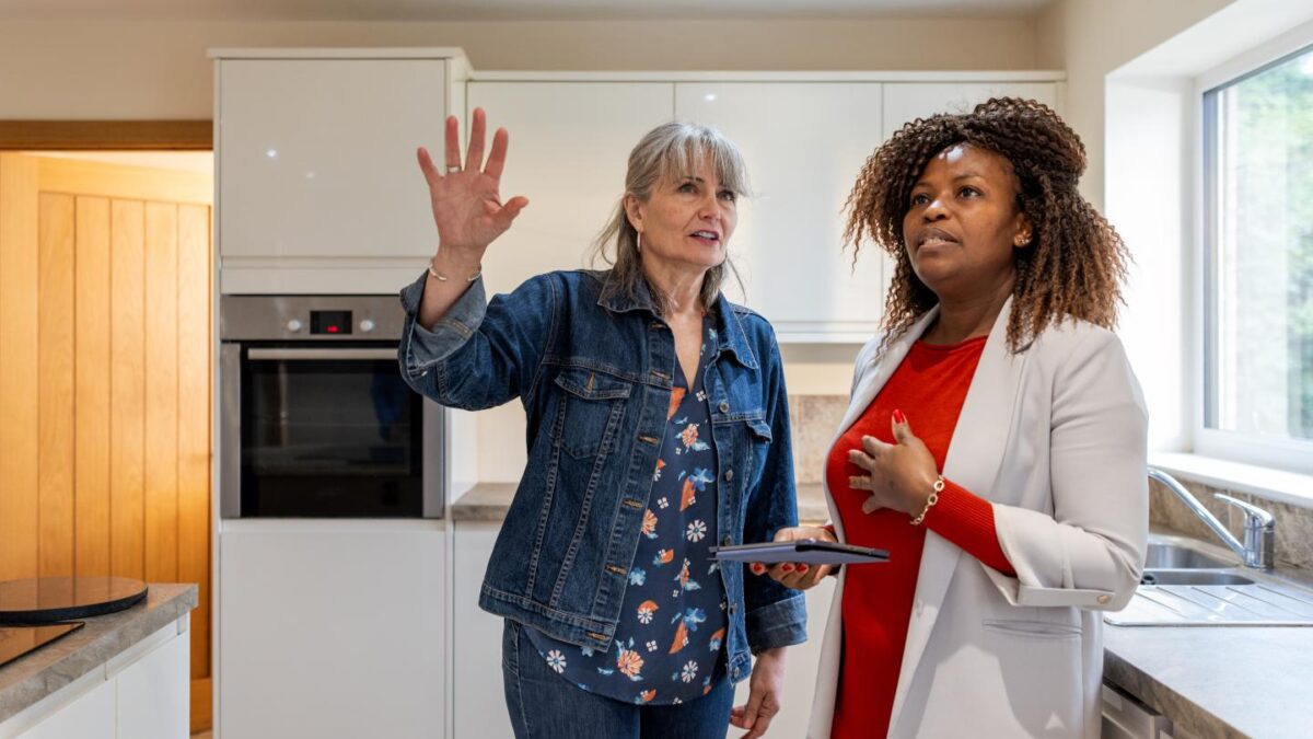 Real estate agent shows middle class home