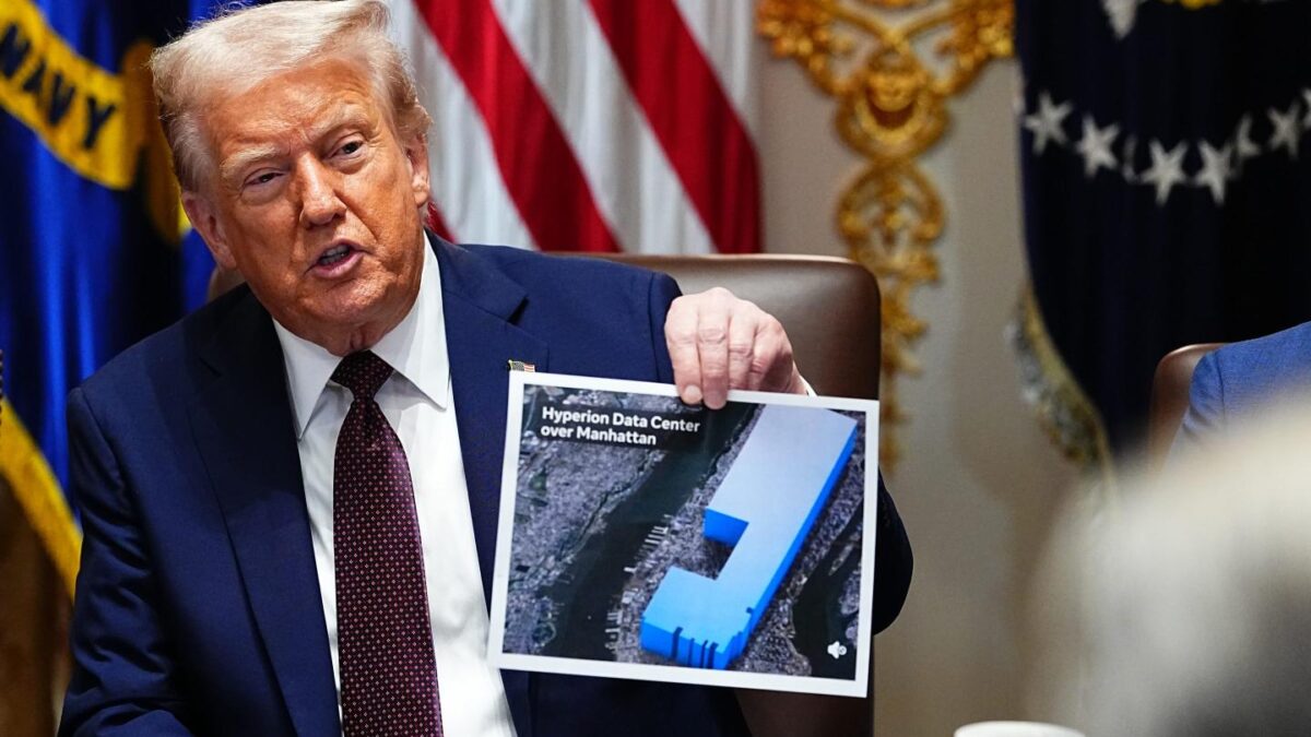 President Donald Trump holds up a graphic comparing the size of Meta's new data center in rural Louisiana dubbed “Hyperion” to Manhattan.
