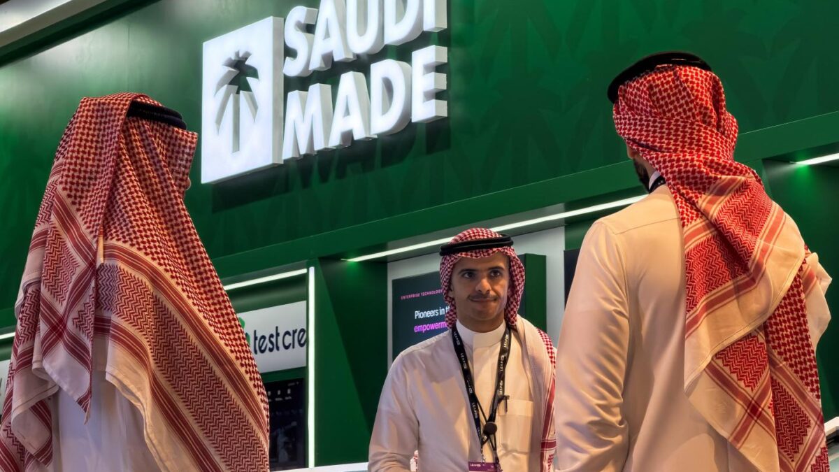 Saudi representatives stand by the Saudi Made pavilion, which showcases the kingdom's technology companies and innovation initiatives, while attending LEAP East 2026 in Hong Kong, the first Asia-Pacific edition of the Saudi-born LEAP technology conference.