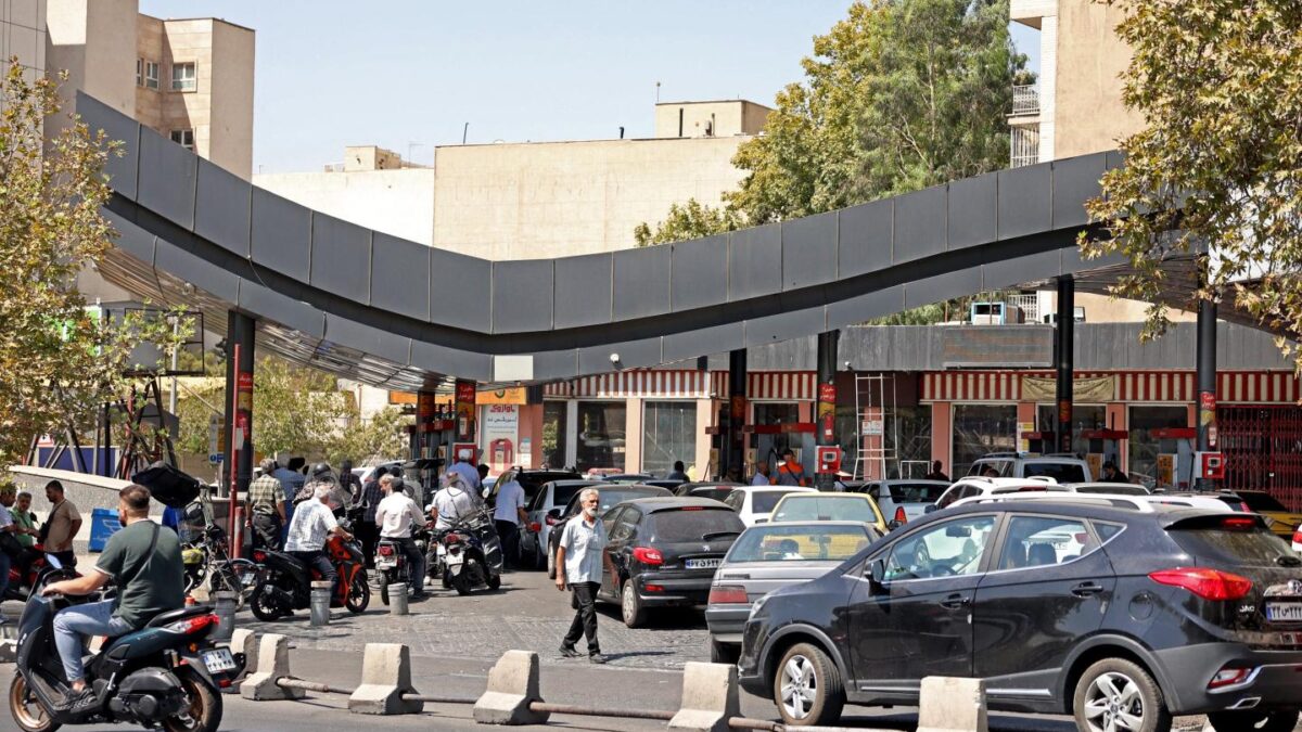Drivers queue at a petrol station to refuel in Tehran, on August 25, 2026.